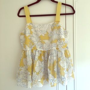 Yellow and white peplum top